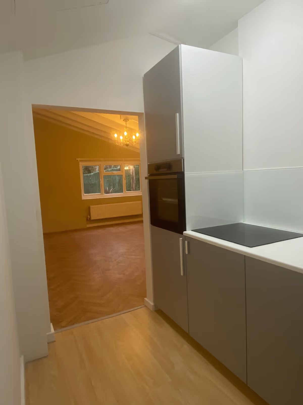 Modern fitted kitchen in apartment at The courtyard