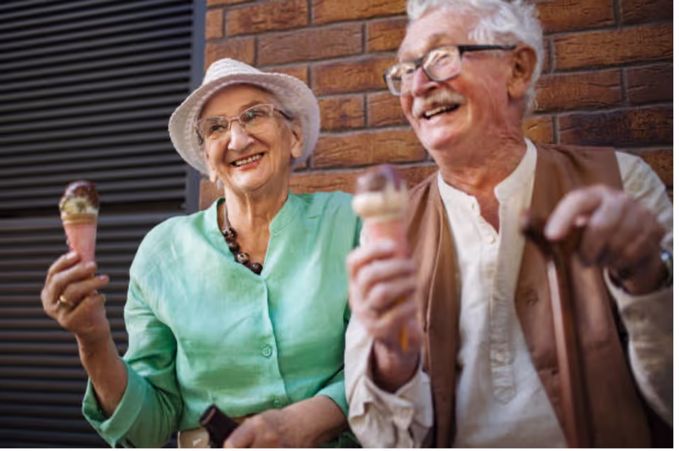 Residents eating ice cream in sun